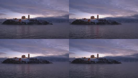 Nubble灯塔在北冰洋烟雾高清在线视频素材下载