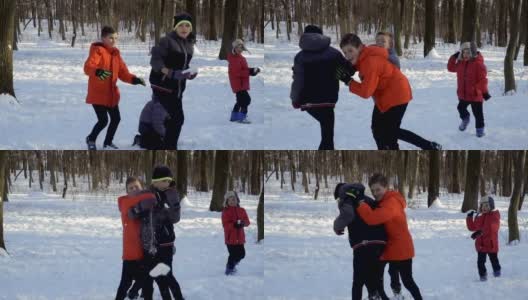 四个小弟弟在冬季公园玩雪球，慢镜头高清在线视频素材下载