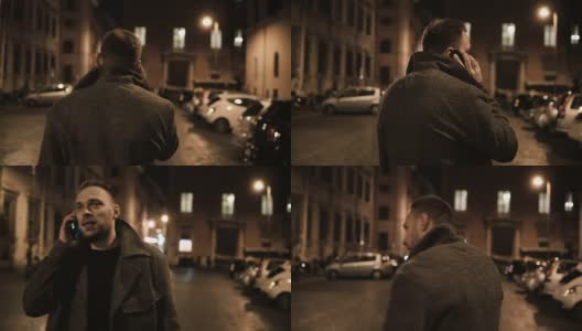 年轻英俊的男子走在晚上的街道上，使用智能手机，与朋友聊天的背影高清在线视频素材下载