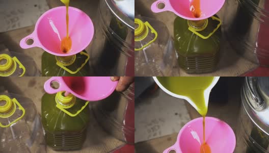 将新鲜的油倒入漏斗-橄榄油磨高清在线视频素材下载