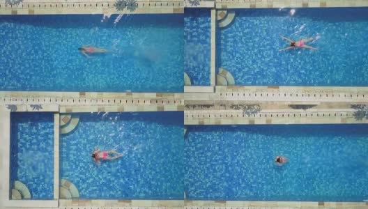 空中俯瞰特写:一个不认识的女人喜欢在游泳池里游泳高清在线视频素材下载