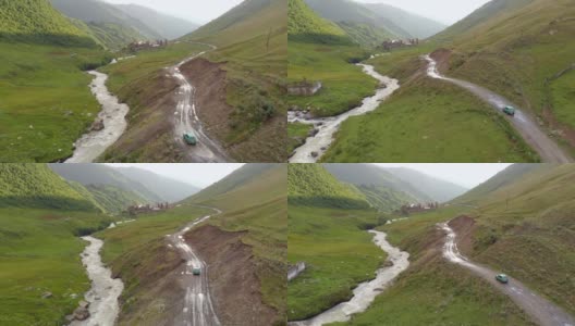 在格鲁吉亚郁郁葱葱的高加索山区，一辆旧汽车行驶在一条崎岖不平的土路上。高清在线视频素材下载