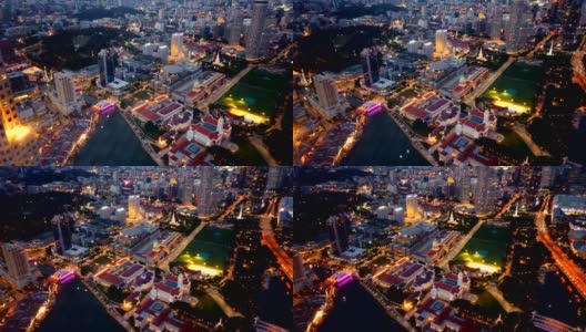 从白天到夜晚的时间流逝，新加坡的城市。从空中俯瞰的天际线。高清在线视频素材下载