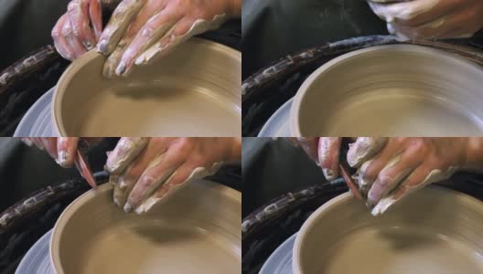 在制陶轮上加工粘土坯时工具的使用高清在线视频素材下载