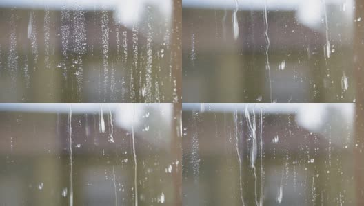 房子前的湿窗和水滴高清在线视频素材下载