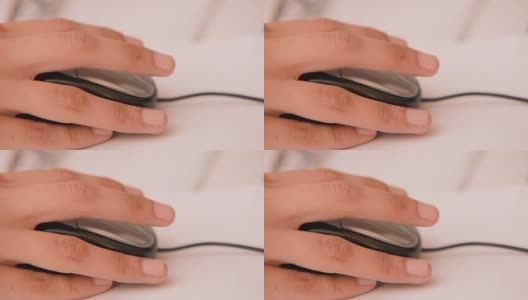 女性的手与电脑鼠标高清在线视频素材下载