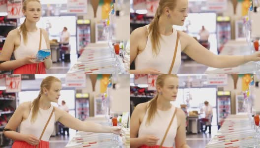 年轻女子在超市买东西高清在线视频素材下载