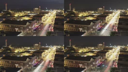 城市在夜间时间流逝，长时间曝光汽车前灯高清在线视频素材下载