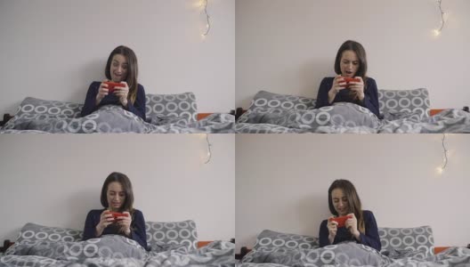 女人在床上玩手机游戏高清在线视频素材下载