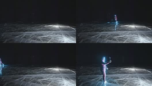 女人是滑冰之夜。女孩在大自然中骑着花样滑冰鞋。一个女人在冰裂缝上骑马。冰上的神奇天使。穿着冰鞋的人们在大自然中享受冬季活动。高清在线视频素材下载