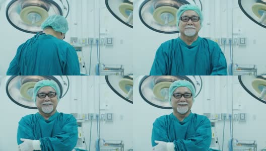 资深男医生看着镜头与迷人的微笑在手术室的背景。医学的概念高清在线视频素材下载