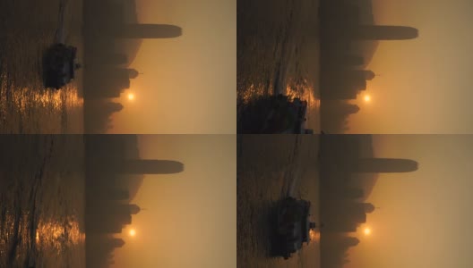 夕阳下维多利亚港的垂直镜头高清在线视频素材下载