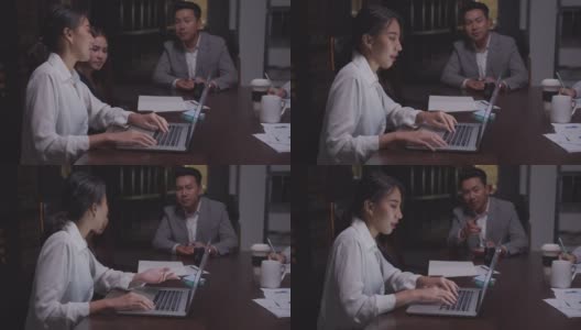 4K分辨率亚洲女商人晚上在办公室开会。商业伙伴讨论和头脑风暴计划。投资财务分析理念，亚洲商业室内生活方式。亚洲同事和团队合作理念，工作到深夜的理念高清在线视频素材下载