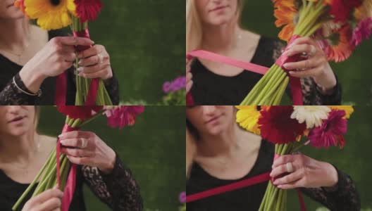 花店用丝带系上美丽的多色花束高清在线视频素材下载