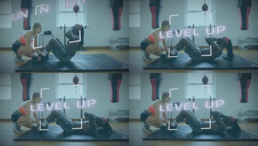 范围超过水平文本对男人在健身房进行仰卧起坐锻炼高清在线视频素材下载