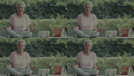 健康生活方式:亚洲老年妇女在户外冥想高清在线视频素材下载