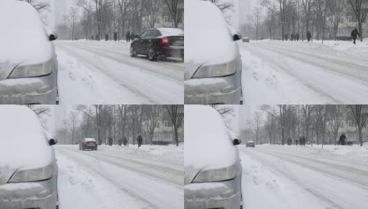 冬天暴风雪期间城市的交通状况。高清在线视频素材下载