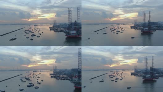 日落时分新加坡造船厂区域的无人机航拍高清在线视频素材下载