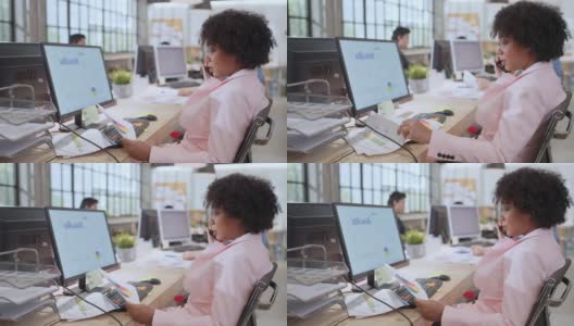 白人女商人在现代办公室工作，具有开朗和快乐的积极思维，有吸引力的创造性女性在办公室使用电脑和纸财务图表业务分析高清在线视频素材下载