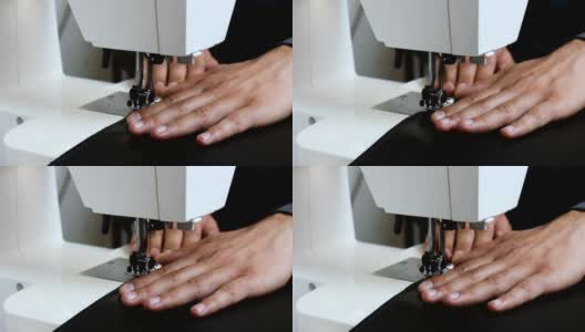 男裁缝手拿皮革后缝纫机高清在线视频素材下载