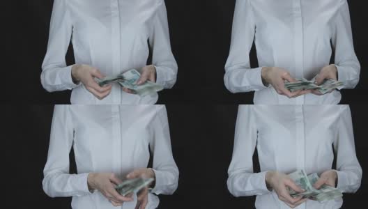 女人迟疑地数着钱，一个俄罗斯卢布高清在线视频素材下载