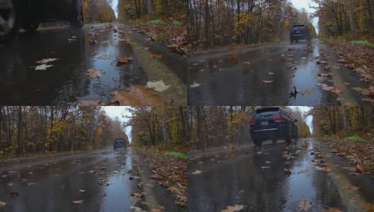 慢镜头近景:黑色SUV汽车潜水在湿滑的道路槽森林高清在线视频素材下载