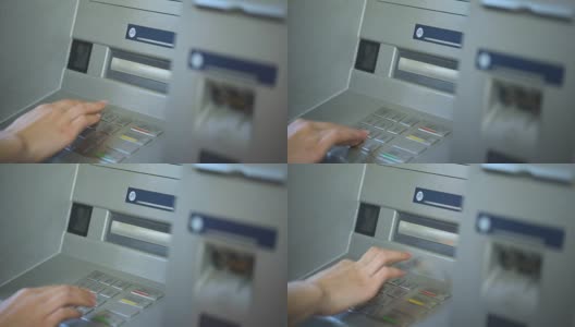 女人按了正确的按钮，把她的密码插入了ATM，银行高清在线视频素材下载