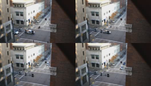 微型城市镜头——小人走过大城市的十字路口高清在线视频素材下载