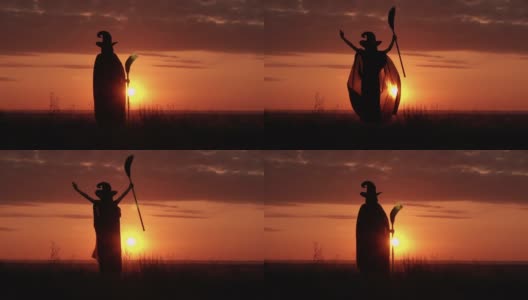 穿着奇装的女孩巫婆拿着扫帚吓城市日出的景色高清在线视频素材下载