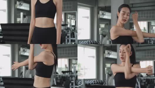 美丽的运动女人在健身房锻炼。高清在线视频素材下载