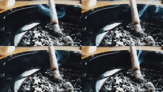烟灰缸里的烟高清在线视频素材下载