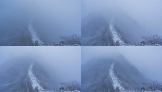 雪景中的中国长城，云雾中的自然风光(延时)高清在线视频素材下载