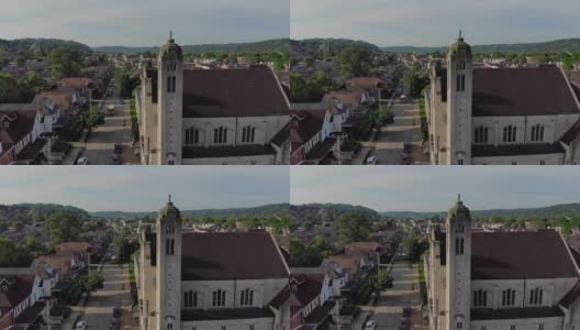 缓慢下降的空中拍摄小镇和教堂高清在线视频素材下载
