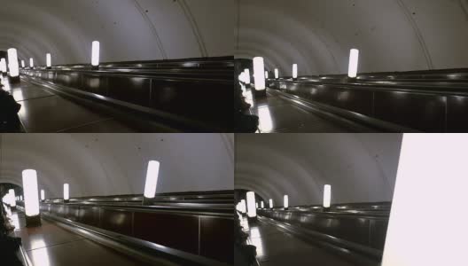 地铁里的自动扶梯正在向下移动。莫斯科地铁站，航空龙卷风高清在线视频素材下载