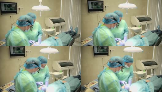 外科医生团队在手术室里一起工作高清在线视频素材下载