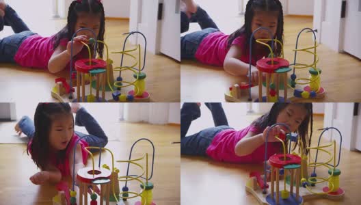 小女孩在玩玩具。高清在线视频素材下载