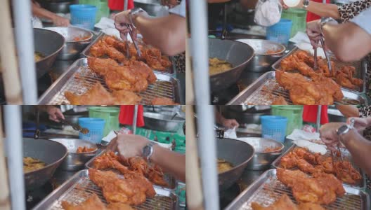 泰国美味炸鸡，小商店在市场，街头小吃。高清在线视频素材下载