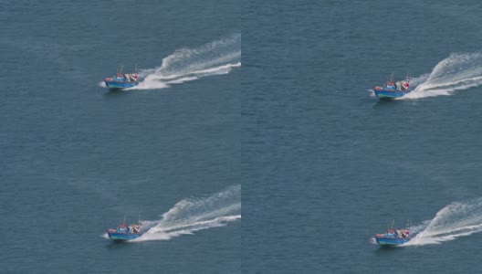 汽艇在大屿山附近的海湾疾驶高清在线视频素材下载