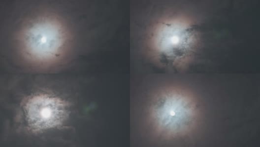 远处的满月和美丽的云彩在夜晚漂浮高清在线视频素材下载
