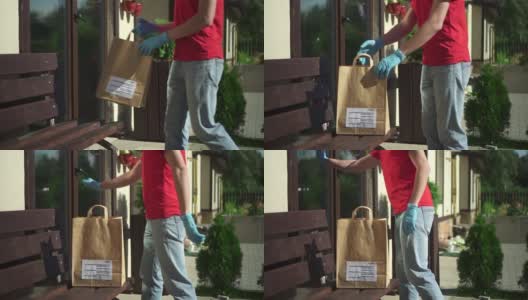 男快递员把纸袋放在门外，敲着房门高清在线视频素材下载