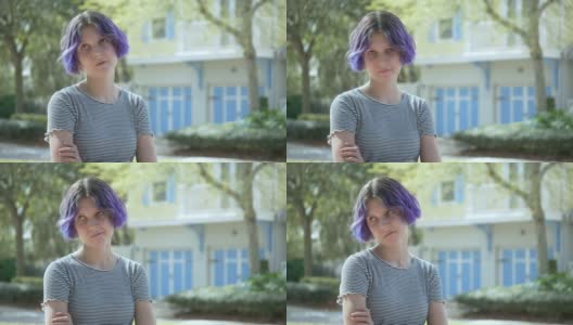 紫色头发的少女翻白眼高清在线视频素材下载