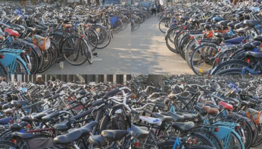 荷兰阿姆斯特丹- 2019年4月21日:自行车停车场。许多不同的自行车停放在街道的特殊停车场。农村的自行车超载问题高清在线视频素材下载