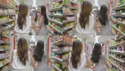 亚洲年轻女子在超市购物，慢镜头。高清在线视频素材下载