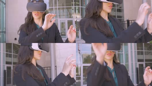 一位女性商务主管戴着虚拟现实眼镜在外面工作高清在线视频素材下载