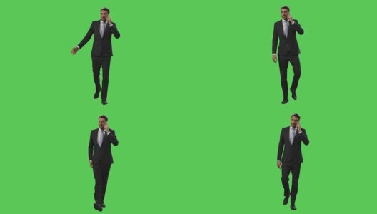 一个穿着西装的商人正在一边走路一边用手机打电话，背景是一个绿色的模拟屏幕。高清在线视频素材下载