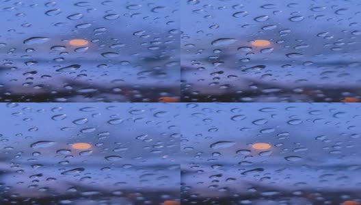 晚上，湿雪滴在汽车玻璃上高清在线视频素材下载