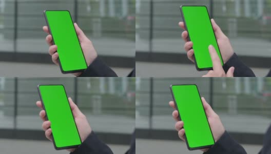 女商人使用智能手机与绿色Chroma屏幕高清在线视频素材下载