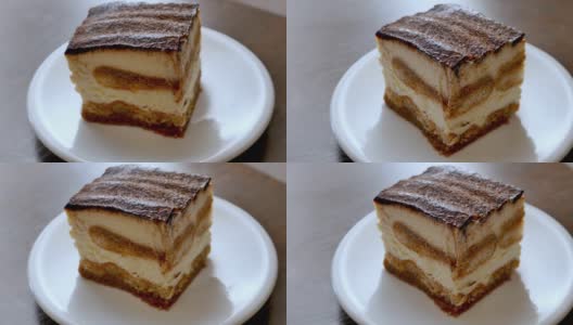 白色盘子里的马斯卡彭提拉米苏蛋糕高清在线视频素材下载