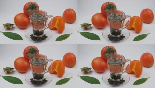 柿子树叶是在玻璃杯里泡的高清在线视频素材下载