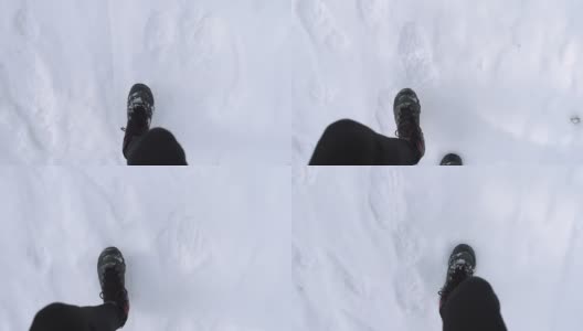 慢动作徒步者的脚在雪道上高清在线视频素材下载